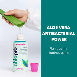 Aloe vera being applied to a bottle of Ahlopo mouthwash with text highlighting aloe vera antibacterial power.