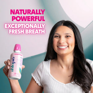 Woman holding a bottle of Ahlo Pro with text about fresh breath on a gradient background