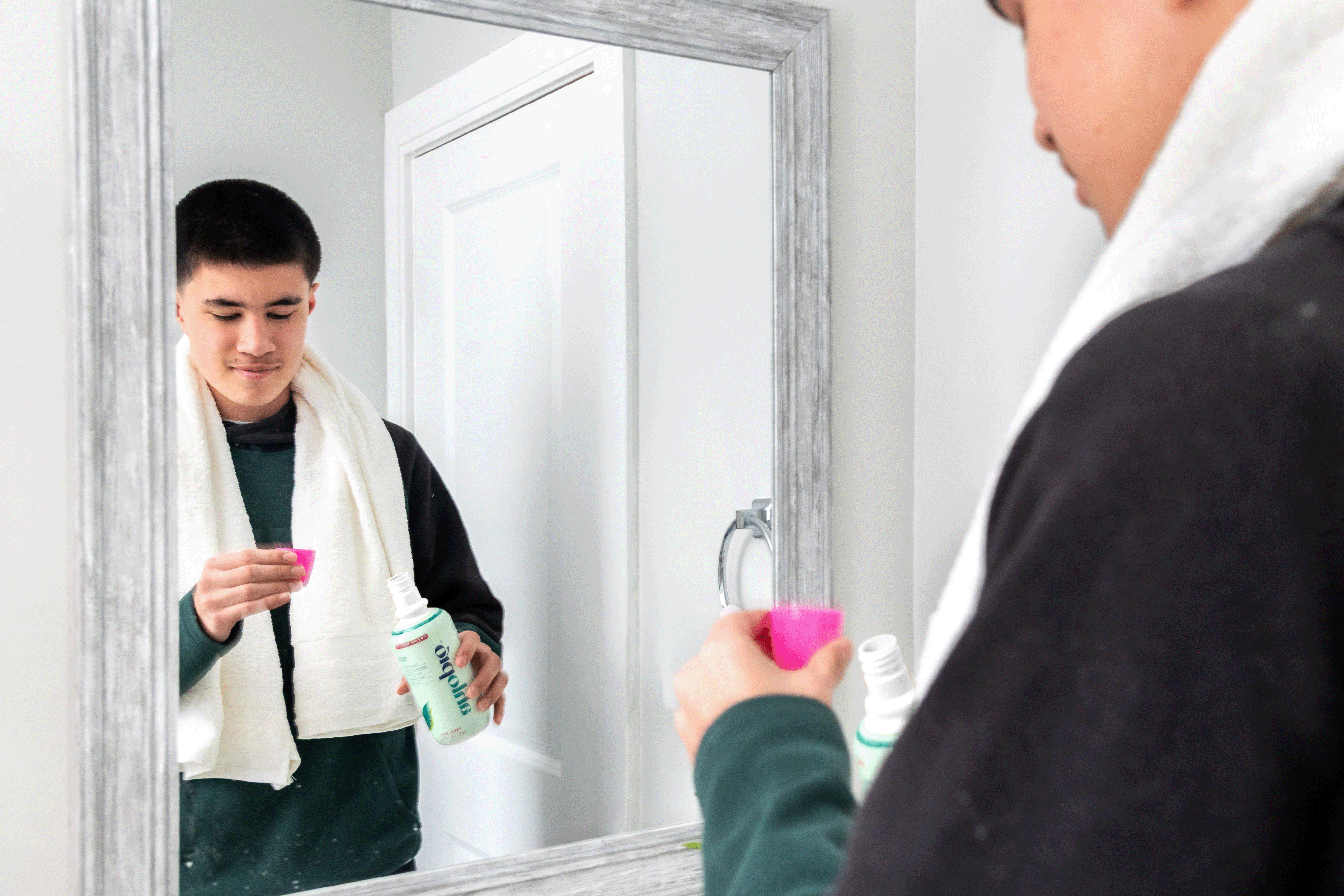 Person Using Ahlo Pro, in the bathroom